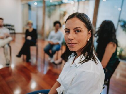 A woman looking directly at the camera