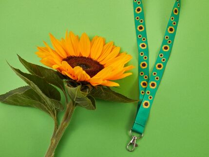 A sunflower and sunflower lanyard